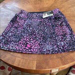 NWT Skechers skirt of 16 inch length and breathable shorts underneath